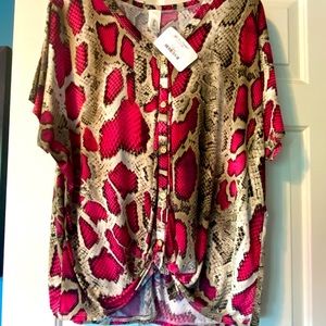 Snakeskin pink top. Very stretchy, wrinkle free material size Large NWT